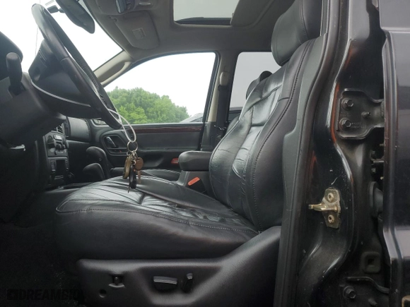 2003 Jeep Grand Cherokee Limited with VIN 1J4GW58N73C569810, listed as a Copart auction lot 57643474 with 123,294 mi miles and Clean Title. Bid and sale history available at carsss.com. Image 7.