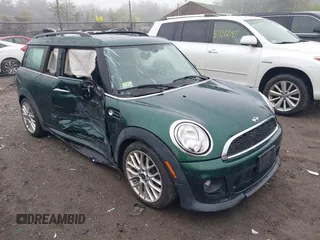 2014 MINI Clubman z VIN WMWZF3C50ET571554, wystawiony jako IAAI lot #42193844 z przebiegiem 70 422 mil mil oraz . Historia ofert i sprzedaży dostępna na DreamBid. Obrazek 1.