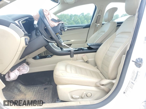 2014 Ford Fusion SE Hybrid with VIN 3FA6P0LU4ER363094, listed as a Copart auction lot 63460005 with 146,925 mi miles and Clean title. Bid and sale history available at DreamBid. Image 7.