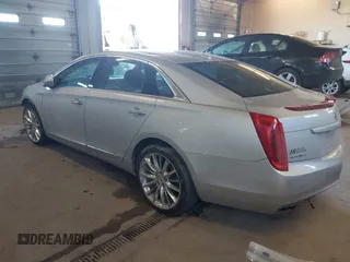 2013 Cadillac XTS Platinum with VIN 2G61V5S31D9190738, listed as a IAAI auction lot 41657461 with 136,924 mi miles and . Bid and sale history available at carsss.com. Image 3.