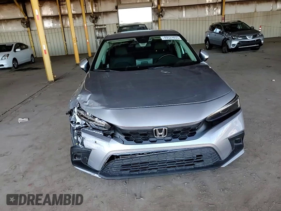 2023 Honda Civic EX-L z VIN 19XFL1H77PE004072, wystawiony jako Copart lot #49524855 z przebiegiem 21 100 mil mil oraz Szkoda całkowita • Salvage title. Historia ofert i sprzedaży dostępna na DreamBid. Obrazek 11.