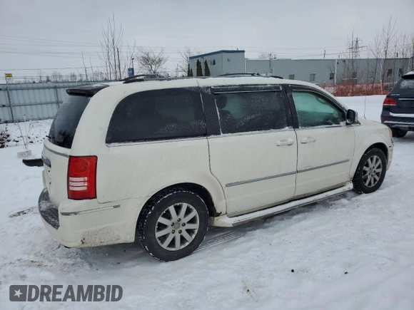 2009 Chrysler Town & Country Touring with VIN 2A8HR54X39R703438, listed as a Copart auction lot 86143644 with 254,748 mi miles and Clean Title. Bid and sale history available at DreamBid. Image 3.