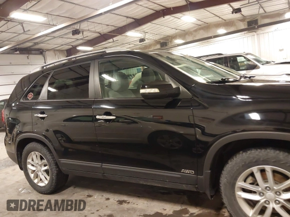 2015 Kia Sorento LX with VIN 5XYKTCA66FG573928, listed as a IAAI auction lot 42017586 with 174,939 mi miles. Bid and sale history available at carsss.com. Image 13.