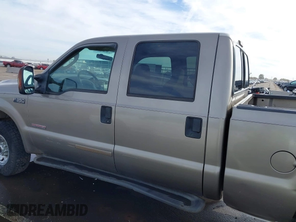 2003 Ford F-350 XL z VIN 1FTSW31P63EC46630, wystawiony jako IAAI lot #41699789 z przebiegiem 129 633 mil mil oraz . Historia ofert i sprzedaży dostępna na DreamBid. Obrazek 14.