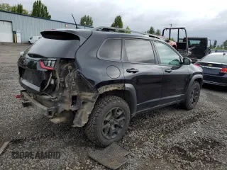 2019 Jeep Cherokee Trailhawk with VIN 1C4PJMBX4KD121641, listed as a Copart auction lot 57128905 with 129,206 mi miles and Salvage title. Bid and sale history available at DreamBid. Image 3.