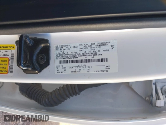 2018 Ford F-150 XL with VIN 1FTEW1E55JKF29898, listed as a IAAI auction lot 40593129 with 158,663 mi miles and . Bid and sale history available at carsss.com. Image 9.
