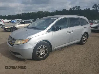 2012 Honda Odyssey EX z VIN 5FNRL5H49CB093495, wystawiony jako Copart lot #57329325 z przebiegiem 218 791 mil mil oraz Szkoda całkowita • Salvage title. Historia ofert i sprzedaży dostępna na DreamBid. Obrazek 1.