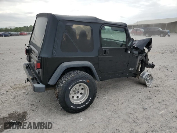 2000 Jeep Wrangler Sport with VIN 1J4FA49S9YP743515, listed as a Copart auction lot 53906305 with 247,349 mi miles and Salvage title. Bid and sale history available at DreamBid. Image 3.