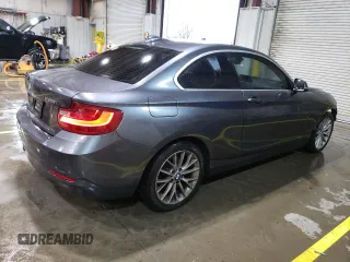 2015 BMW 2 Series 228i with VIN WBA1F5C57FV256684, listed as a Copart auction lot 51747435 with 136,140 mi miles and Clean Title. Bid and sale history available at carsss.com. Image 3.