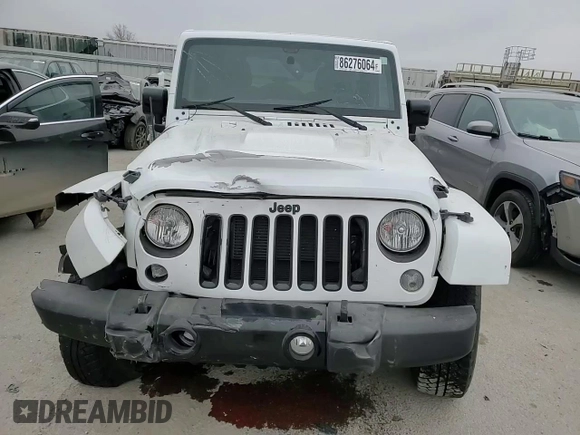 2015 Jeep Wrangler Altitude z VIN 1C4GJWBG8FL730965, wystawiony jako Copart lot #86276064 z przebiegiem 43 541 mil mil oraz Szkoda całkowita • Salvage title. Historia ofert i sprzedaży dostępna na DreamBid. Obrazek 12.