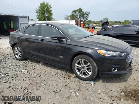 2016 Ford Fusion Titanium with VIN 3FA6P0SU7GR349548, listed as a Copart auction lot 53116325 with 124,354 mi miles and Salvage title. Bid and sale history available at DreamBid. Image 4.