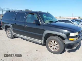2003 Chevrolet Suburban Z71 with VIN 3GNFK16Z73G327275, listed as a IAAI auction lot 42271570 with 290,385 mi miles and . Bid and sale history available at DreamBid. Image 1.
