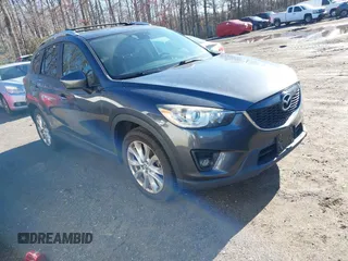 2014 Mazda CX-5 Grand Touring with VIN JM3KE2DY2E0333787, listed as a IAAI auction lot 41861328 with 145,892 mi miles. Bid and sale history available at carsss.com. Image 1.