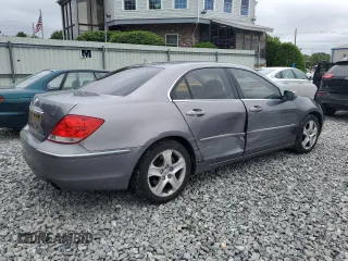 2005 Acura RL z VIN JH4KB16575C013649, wystawiony jako Copart lot #61172125 z przebiegiem 140 503 mil mil oraz Czysty tytuł • Clean title. Historia ofert i sprzedaży dostępna na DreamBid. Obrazek 3.