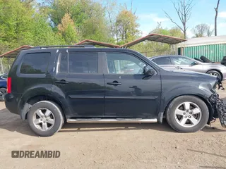 2011 Honda Pilot EX-L with VIN 5FNYF4H63BB004288, listed as a IAAI auction lot 42084984 with 215,019 mi miles and . Bid and sale history available at carsss.com. Image 14.