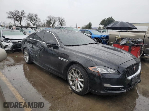 2016 Jaguar XJ R-Sport with VIN SAJWA1C70G8W02383, listed as a Copart auction lot 43961645 with 43,719 mi miles and Salvage title. Bid and sale history available at DreamBid. Image 4.