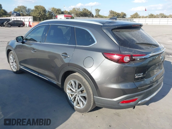 2016 Mazda CX-9 Grand Touring with VIN JM3TCADY8G0114940, listed as a IAAI auction lot 40701187 with 112,311 mi miles and . Bid and sale history available at DreamBid. Image 3.