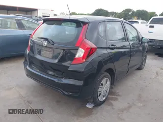 2020 Honda Fit LX z VIN 3HGGK5H40LM717305, wystawiony jako IAAI lot #42093169 z przebiegiem 69 665 mil mil oraz . Historia ofert i sprzedaży dostępna na DreamBid. Obrazek 4.