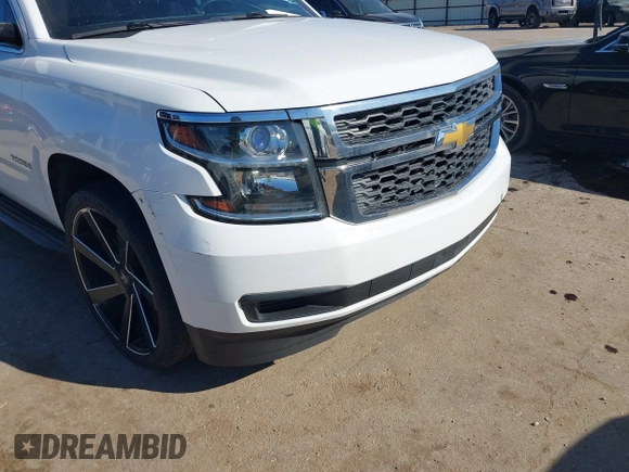 2015 Chevrolet Tahoe LS with VIN 1GNSCAKCXFR748554, listed as a IAAI auction lot 41765865 with 160,282 mi miles and . Bid and sale history available at DreamBid. Image 6.