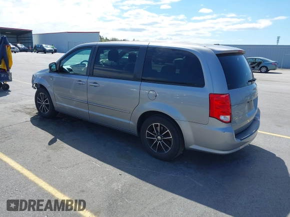 2014 Dodge Grand Caravan SXT with VIN 2C4RDGCGXER261467, listed as a IAAI auction lot 41801810 with 97,322 mi miles and . Bid and sale history available at DreamBid. Image 3.