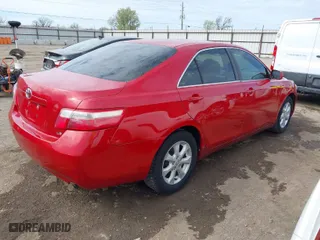 2007 Toyota Camry CE with VIN 4T1BE46K77U109046, listed as a IAAI auction lot 41870289 with 129,027 mi miles. Bid and sale history available at carsss.com. Image 4.