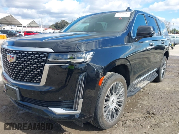 2022 Cadillac Escalade Luxury z VIN 1GYS4AKL2NR110264, wystawiony jako IAAI lot #41576203 z przebiegiem 29 457 mil mil oraz . Historia ofert i sprzedaży dostępna na DreamBid. Obrazek 2.
