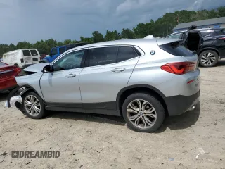 2018 BMW X2 sDrive28i with VIN WBXYJ3C39JEJ82814, listed as a Copart auction lot 59498615 with 74,550 mi miles and Salvage title. Bid and sale history available at DreamBid. Image 2.