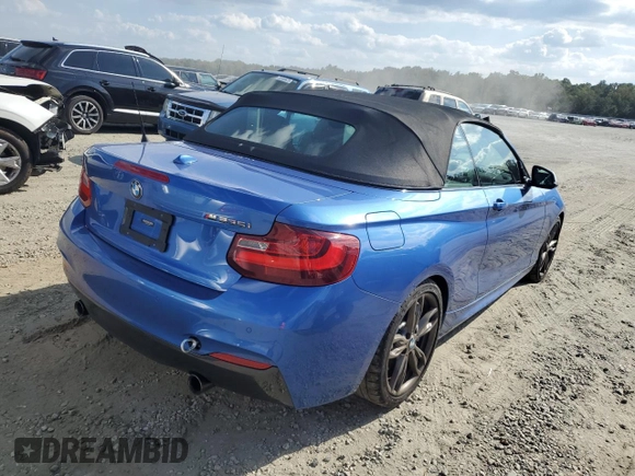 2015 BMW 2 Series M235i with VIN WBA1M1C53FV393104, listed as a Copart auction lot 71143703 with 12,025 mi miles. Bid and sale history available at carsss.com. Image 3.