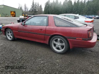 1987 Toyota Supra z VIN JT2MA70J6H0060238, wystawiony jako Copart lot #84754334 z przebiegiem 201 761 mil mil oraz Czysty tytuł • Clean title. Historia ofert i sprzedaży dostępna na DreamBid. Obrazek 2.