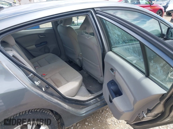 2010 Honda Insight EX with VIN JHMZE2H71AS008487, listed as a IAAI auction lot 42533409 with 95,765 mi miles and . Bid and sale history available at DreamBid. Image 8.