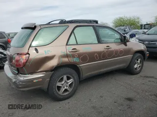 1999 Lexus RX 300 with VIN JT6HF10U1X0071946, listed as a Copart auction lot 53566055 with 133,138 mi miles and Salvage Title. Bid and sale history available at DreamBid. Image 3.