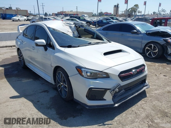 2019 Subaru WRX STI z VIN JF1VA2R6XK9814201, wystawiony jako IAAI lot #41641582 z przebiegiem 57 327 mil mil oraz . Historia ofert i sprzedaży dostępna na DreamBid. Obrazek 1.