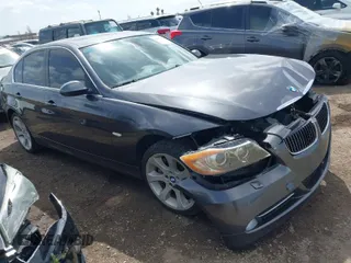 2007 BMW 3 Series 335xi with VIN WBAVD53577A006071, listed as a IAAI auction lot 41924859 with 128,693 mi miles. Bid and sale history available at carsss.com. Image 1.