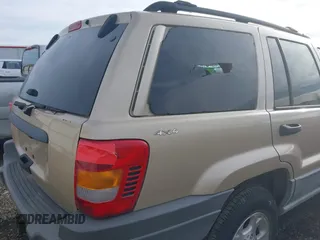 2000 Jeep Grand Cherokee Laredo with VIN 1J4GW48S4YC256978, listed as a IAAI auction lot 40652709 with 117,859 mi miles and . Bid and sale history available at DreamBid. Image 6.