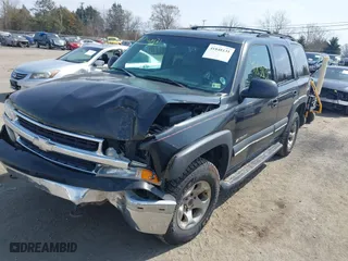 2003 Chevrolet Tahoe Z71 with VIN 1GNEK13Z13R166468, listed as a IAAI auction lot 41848131 with 163,738 mi miles. Bid and sale history available at carsss.com. Image 2.