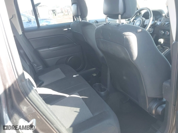 2014 Jeep Patriot Sport with VIN 1C4NJPBA0ED758437, listed as a IAAI auction lot 41532633 with 138,572 mi miles. Bid and sale history available at carsss.com. Image 8.