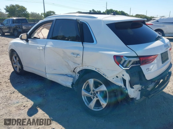 2021 Audi Q3 Premium with VIN WA1AUCF32M1097059, listed as a IAAI auction lot 41825132 with 66,144 mi miles and . Bid and sale history available at DreamBid. Image 3.