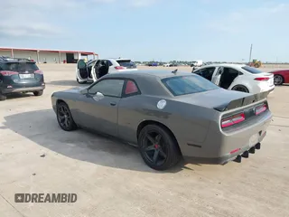 2017 Dodge Challenger R/T with VIN 2C3CDZBT8HH666130, listed as a IAAI auction lot 42173702 with 94,857 mi miles and . Bid and sale history available at DreamBid. Image 3.