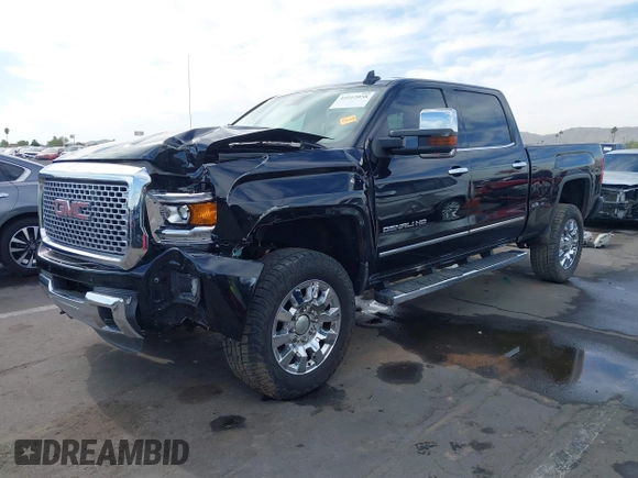 2015 GMC Sierra 2500HD Denali z VIN 1GT120E86FF667058, wystawiony jako IAAI lot #42212058 z przebiegiem 104 069 mil mil oraz . Historia ofert i sprzedaży dostępna na DreamBid. Obrazek 6.
