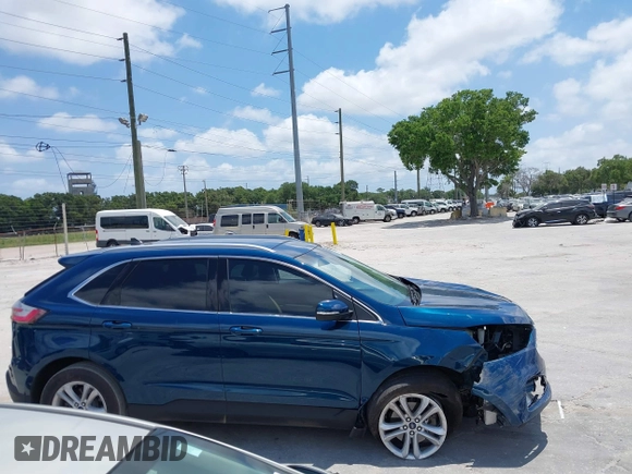2020 Ford Edge SEL z VIN 2FMPK3J94LBB45306, wystawiony jako IAAI lot #39398218 z przebiegiem 59 807 mil mil oraz . Historia ofert i sprzedaży dostępna na DreamBid. Obrazek 14.