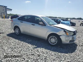 2009 Ford Focus SE with VIN 1FAHP35N09W267059, listed as a Copart auction lot 54155965 with 129,768 mi miles and Salvage Title. Bid and sale history available at carsss.com. Image 4.