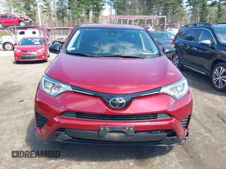 2018 Toyota RAV4 LE with VIN JTMBFREV2JD228186, listed as a IAAI auction lot 42076730 with 93,899 mi miles. Bid and sale history available at carsss.com. Image 17.