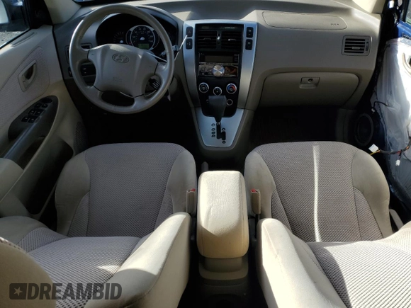 2009 Hyundai Tucson SE with VIN KM8JN72D89U977046, listed as a Copart auction lot 80712994 with 60,863 mi miles and Salvage Title. Bid and sale history available at carsss.com. Image 8.