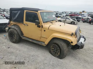 2014 Jeep Wrangler Sahara with VIN 1C4AJWBG8EL144691, listed as a Copart auction lot 71172514 with 111,322 mi miles and Salvage title. Bid and sale history available at DreamBid. Image 4.