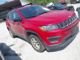 2018 Jeep Compass Sport with VIN 3C4NJCABXJT502717, listed as a IAAI auction lot 41985204 with 124,900 mi miles and . Bid and sale history available at DreamBid. Image 1.