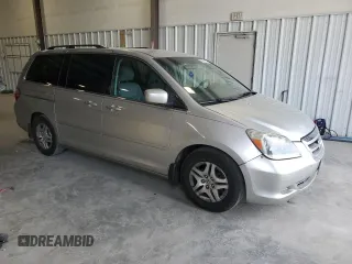 2007 Honda Odyssey EX with VIN 5FNRL38477B429624, listed as a Copart auction lot 53961825 with 144,957 mi miles and Salvage Title. Bid and sale history available at DreamBid. Image 4.