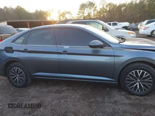 2021 Volkswagen Jetta S z VIN 3VWC57BU2MM023545, wystawiony jako IAAI lot #41285910 z przebiegiem 79 753 mil mil oraz . Historia ofert i sprzedaży dostępna na DreamBid. Obrazek 13.