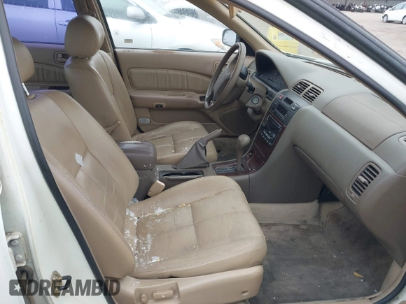 1999 Nissan Maxima GXE with VIN JN1CA21D7XT811913, listed as a IAAI auction lot 42374679 with 209,172 mi miles and . Bid and sale history available at DreamBid. Image 5.