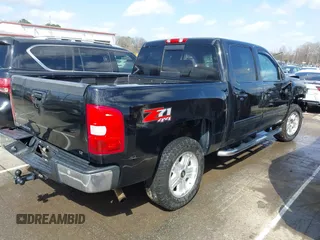 2013 Chevrolet Silverado 1500 LT with VIN 3GCPKSE71DG329253, listed as a IAAI auction lot 41723597 with 164,539 mi miles. Bid and sale history available at carsss.com. Image 4.