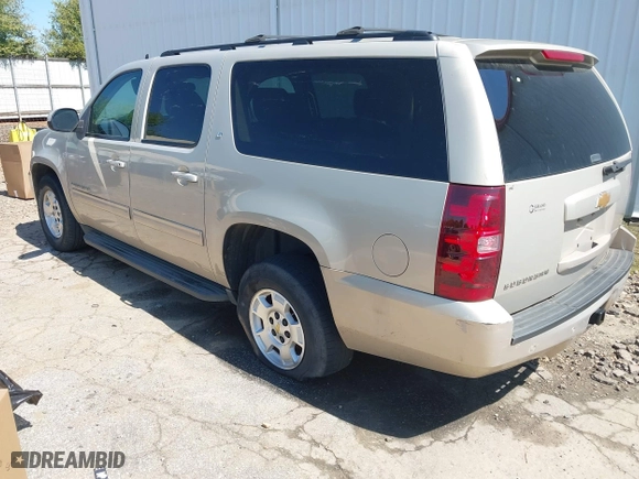 2012 Chevrolet Suburban LT with VIN 1GNSCJE03CR128206, listed as a IAAI auction lot 42002119 with 329,078 mi miles. Bid and sale history available at carsss.com. Image 3.